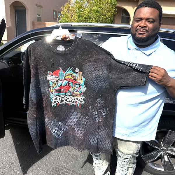 Customer wearing a custom shirt printed in Las Vegas